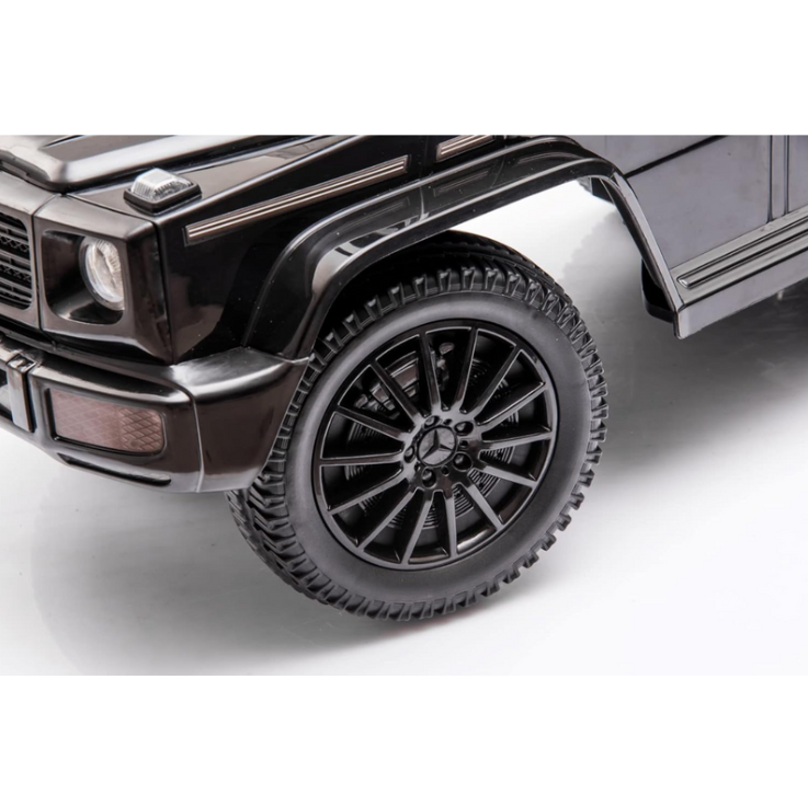 Mercedes G baby-schommelauto – Duwstang en schuiffunctie, vanaf 1 jaar (zwart)