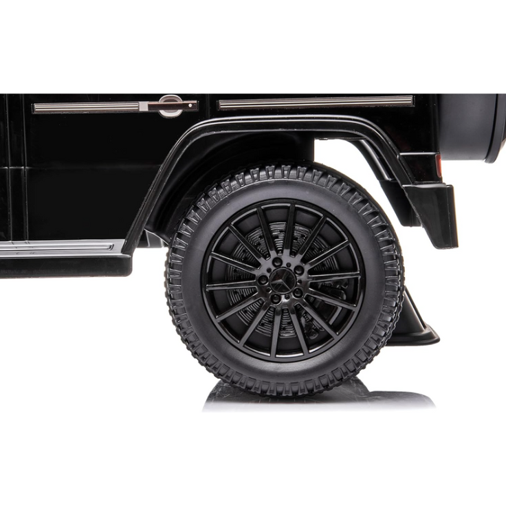 Mercedes G baby-schommelauto – Duwstang en schuiffunctie, vanaf 1 jaar (zwart)